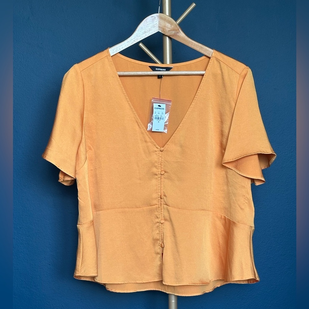 EXPRESS Short Sleeve Peplum shirt, light & feminine.